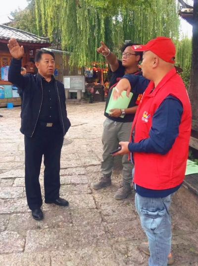 【丽江“十一”黄金周】​5年来，逢假必见周旭江