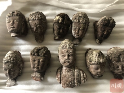 打开 四川夹江10颗佛头被盗4年后终回家 