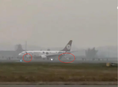 惊魂一刻！九元航空一航班空中突发火警，急降长沙机场，乘客从充气滑梯紧急撤离