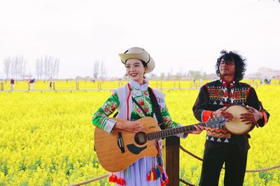 坐着动车去云南邂逅金色花事 云南铁路多措并举护航“三八”踏春潮