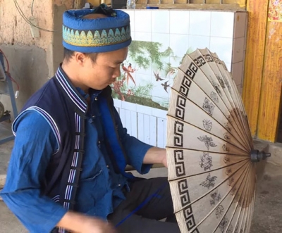探寻丘北壮族水竹花伞传统手工制作技艺