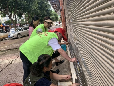 文山州文旅局开展“双报到双服务双报告”暨党员进社区创卫工作主题党日活动